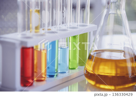 Science Liquid tube biology laboratory chemical fluid scientist. chemistry glass tubes objects lab background. object testing tubes medical glassware. Chemistry scientific pharmaceutical background 136330429