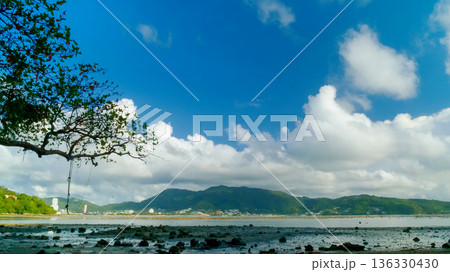 Blue sea white beach turquoise ocean wave coastal in tropical paradise landscape. Beautiful scene seascape marine coastline destinations. Tropical beautiful blue ocean lagoon lake travel summer time. 136330430