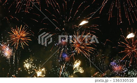 Colorful vibrant Firework celebrate anniversary happy new year 2024, 4th of july holiday festival. colorful firework in night time to celebrate national holiday. countdown new year party background 136330510