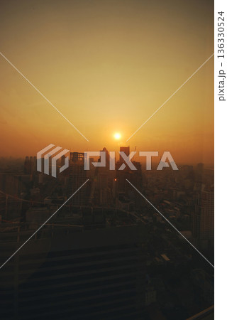 Sunset Amazing Bangkok city skyline with blue sky. Golden time Beautiful skyscraper bangkok midtown landscape. Capital building background modern office district. downtown City night life 136330524