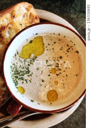 close up creamy soup in cup  136330695