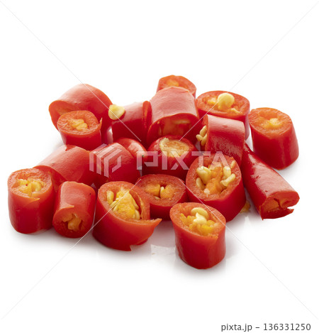 sliced red hot chili peppers isolated on a white background sliced red hot chili peppers isolated on a white background 136331250