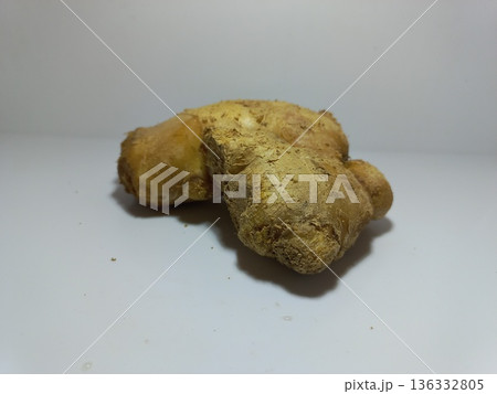 Raw Ginger Root on Clean White Surface 136332805