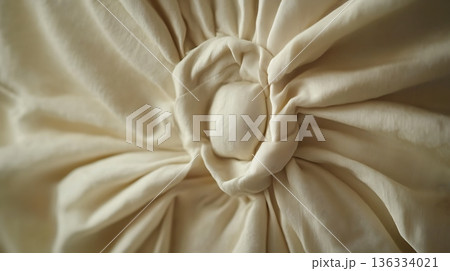 A white pillow with a flowery design on it A white pillow with a flowery design on it 136334021