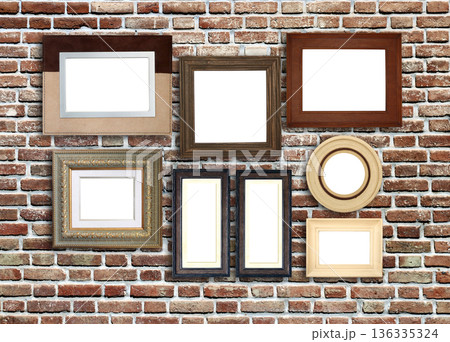 Horizontal banner with blank picture frames hanging on brick wall. Empty photo frame set on wall background. Mock up poster frame template for decor room. Retro Interior design. Copy space for text Horizontal banner with blank picture frames hanging on brick wall. Empty photo frame set on wall background. Mock up poster frame template for decor room. Retro Interior design. Copy space for text 136335324