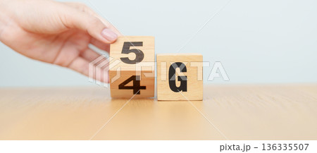 hand change wooden block from 4G to 5G, Generation of Cellular Mobile Communications, Technology, network, Social media and digital concepts hand change wooden block from 4G to 5G, Generation of Cellular Mobile Communications, Technology, network, Social media and digital concepts 136335507