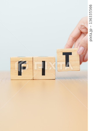 wooden block FIT. Fitness, Exercise, Healthy, Wellness, motivation and wellbeing concepts wooden block FIT. Fitness, Exercise, Healthy, Wellness, motivation and wellbeing concepts 136335566