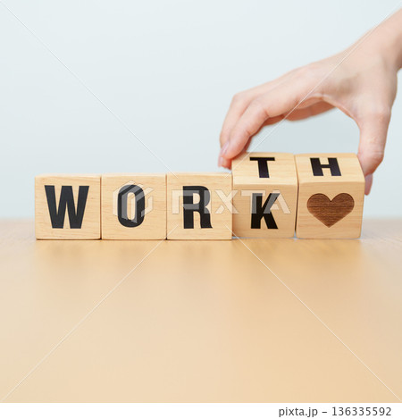 hand change wooden block Work to Worth. Know your worth concept 136335592