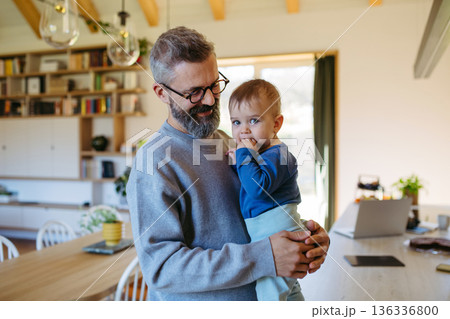 Father with little toddler son at home. Father with little toddler son at home. 136336800