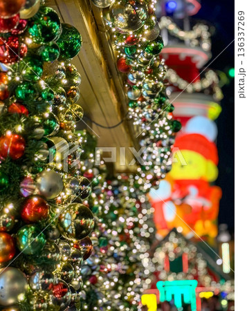 Festive Christmas Street Decorations With Shiny Ornaments And Lights At Night 136337269