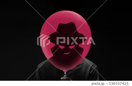 Red balloon hiding dark shadow of scammer behind. Cybersecurity and Zero Trust Red balloon hiding dark shadow of scammer behind. Cybersecurity and Zero Trust 136337425