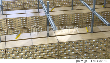 Repetitive rows of wooden card catalog cabinets inside a large archive or library interior. Linear Repetitive rows of wooden card catalog cabinets inside a large archive or library interior. Linear 136338360