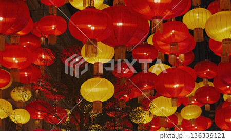Vibrant red and yellow chinese lanterns at night 136339121