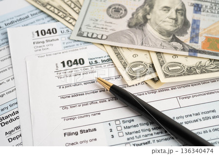 Tax form 1040 U.S. Individual Income Tax Return and bitcoin, business finance, Digital currency, Virtual cryptocurrency. Tax form 1040 U.S. Individual Income Tax Return and bitcoin, business finance, Digital currency, Virtual cryptocurrency. 136340474