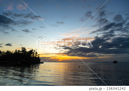 Sunset on Lia beach, Waleakodi Island, Togian archipelago, Sulawesi, Indonesia Sunset on Lia beach, Waleakodi Island, Togian archipelago, Sulawesi, Indonesia 136341242