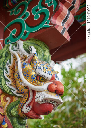 Ornate Asian temple dragon guardian 136341606