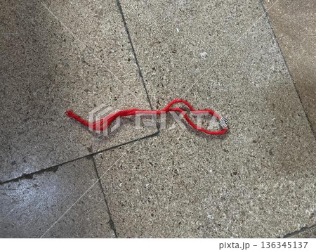 orthodox bracelet on the floor in the church 136345137