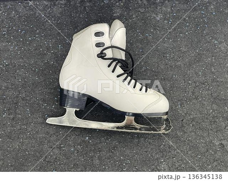 skate for ice on the gray background skate for ice on the gray background 136345138