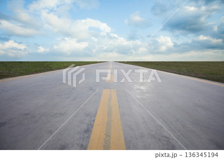 Straight highway road and blue sky with white clouds 136345194