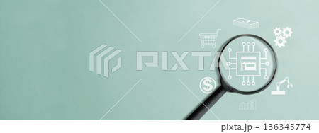 Magnifying glass highlighting a shop icon on a circuit board, surrounded by e-commerce and automation symbols on a teal background. Concept of digital business research and transformation 136345774