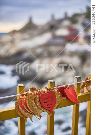 Heart-shaped prayer plaques at Haedong Yonggungsa Buddhist temple in Gijang-gun, Busan, South Korea 136346441