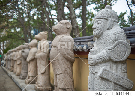 Buddhist statues in Haedong Yonggungsa Buddhist temple in Gijang-gun in Busan, South Korea Buddhist statues in Haedong Yonggungsa Buddhist temple in Gijang-gun in Busan, South Korea 136346446