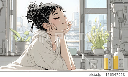 スキンケアを念入りに行う若い女性