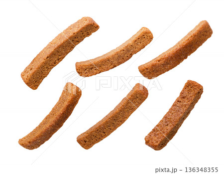 Set of rye croutons on a white background. Top view Set of rye croutons on a white background. Top view 136348355