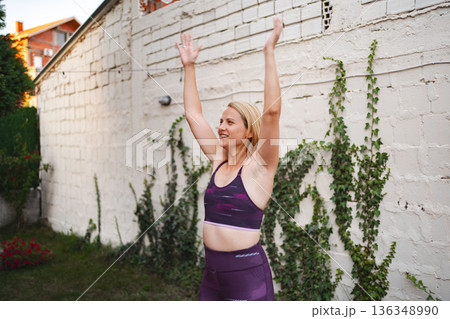 Mother embraces fitness journey outdoors after childbirth to feel revitalized Mother embraces fitness journey outdoors after childbirth to feel revitalized 136348990