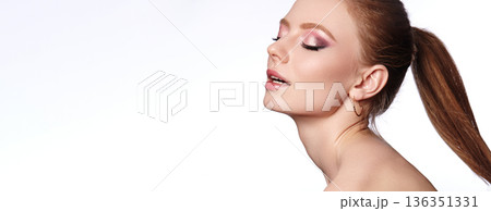 Peaceful Radiant Woman. Calm Beauty With Shimmering Eyes. Serene Lady With Glowing Skin And Elegant Hair. Relaxed Female Model Showcasing Luminous Complexion And Subtle Makeup, Ponytail Hairstyle Peaceful Radiant Woman. Calm Beauty With Shimmering Eyes. Serene Lady With Glowing Skin And Elegant Hair. Relaxed Female Model Showcasing Luminous Complexion And Subtle Makeup, Ponytail Hairstyle 136351331