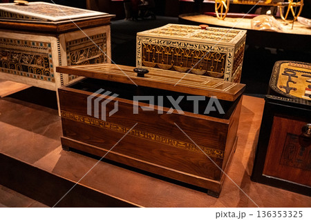 Ancient Egyptian Wooden Coffer with Hieroglyphs in Museum. Canopic chest 136353325