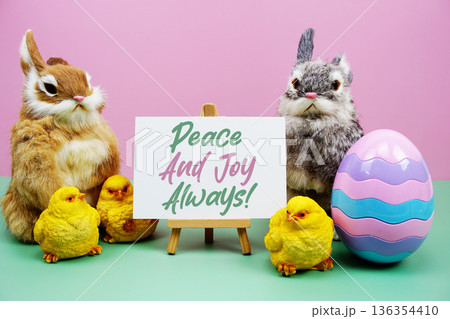 Peace And Joy Always! text with easter elements decoration on pink and green background Peace And Joy Always! text with easter elements decoration on pink and green background 136354410