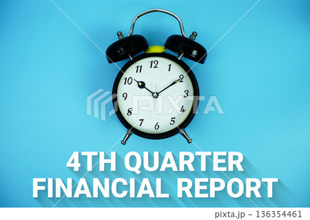 Fourth Quarter Results text and alarm clock on blue background 136354461