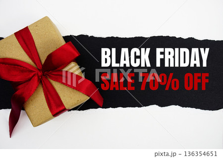 Black Friday Sale text with gift box present on black background 136354651