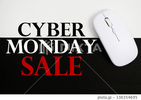 Cyber Monday Sale and wireless mouse on white and black background 136354695