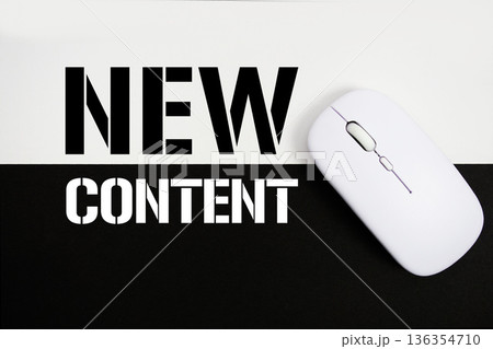 New Content text and wireless mouse on white and black background New Content text and wireless mouse on white and black background 136354710
