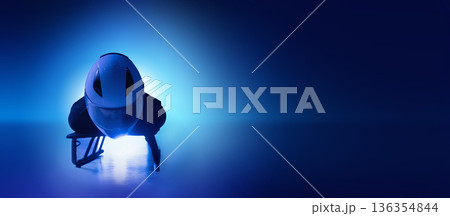 Digital artwork of skeleton athlete in head-first position on blue ice background. 136354844