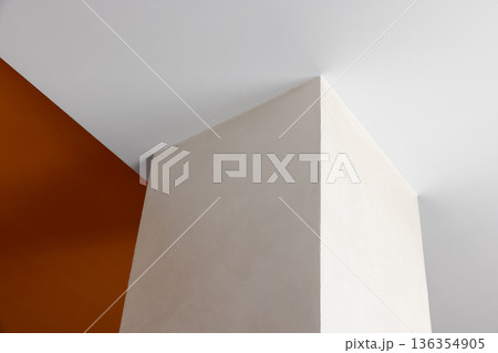 A stark white pillar rises at a sharp angle 136354905