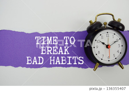 Time To Break Bad Habits text on purple with white paper torn ripped of horizontal and alarm clock 136355407