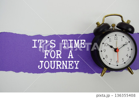 It's Time For A Journey text on purple with white paper torn ripped of horizontal and alarm clock 136355408