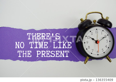 There's No Time Like The Present text on purple with white paper torn ripped of horizontal and alarm clock 136355409