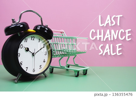 Last Chance Sale text with trolley shopping cart 136355476