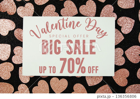 Valentine's Big Sale 70% off with pink heart on black background Valentine's Big Sale 70% off with pink heart on black background 136356806