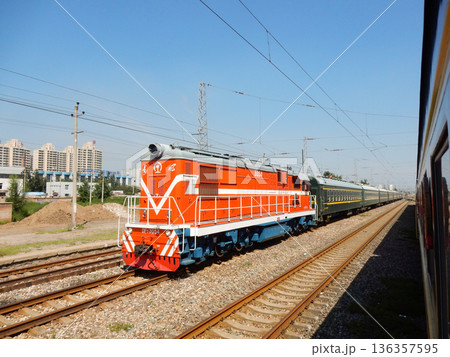 Orange Locomotive Train in CHina Orange Locomotive Train in CHina 136357595