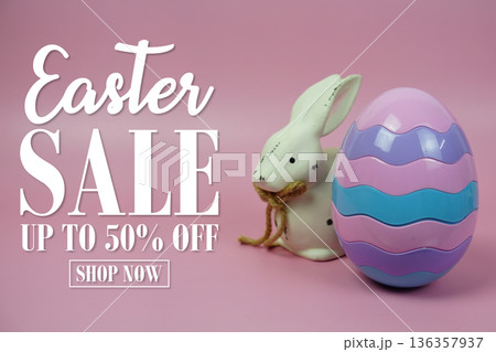 Easter Sale 50% promotion with Easter Egg and rabbits decorations concept on pink background 136357937