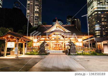 Night view of the Nishikubo Hachima Jinja building, a Shinto shrine in Toranomon, Minato, Tokyo, Japan. Night view of the Nishikubo Hachima Jinja building, a Shinto shrine in Toranomon, Minato, Tokyo, Japan. 136358169