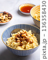 Millet porridge with mixed nuts 136358430