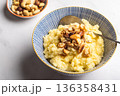 Millet porridge with mixed nuts 136358431