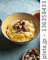 Millet porridge with mixed nuts 136358433
