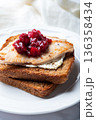 Open sandwich from leftover turkey and cranberry sauce 136358434